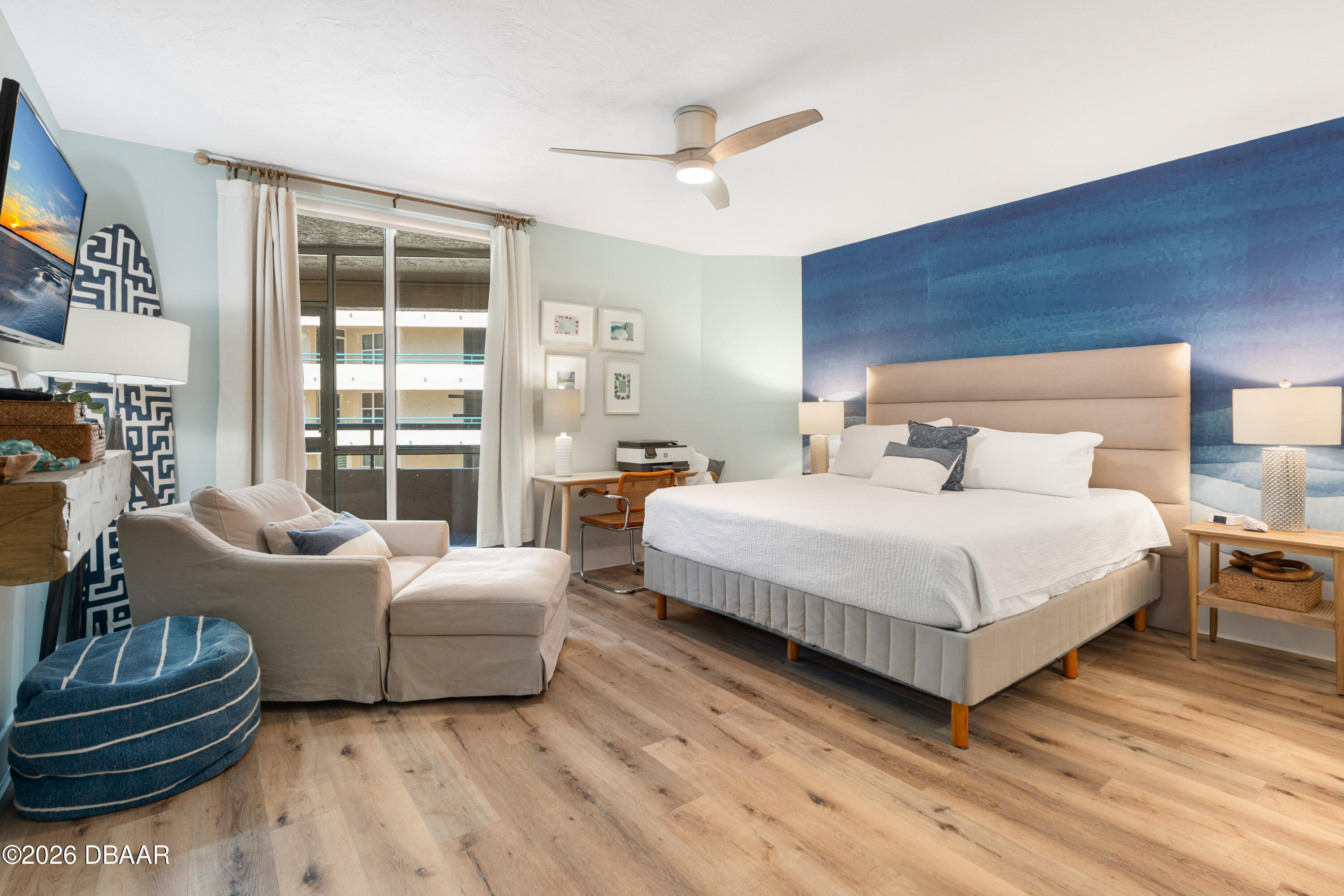 4565 South Atlantic Avenue, Unit 5410 Ponce Inlet, FL 32127 - Photo 40 of 67 a bedroom with a bed and a large window