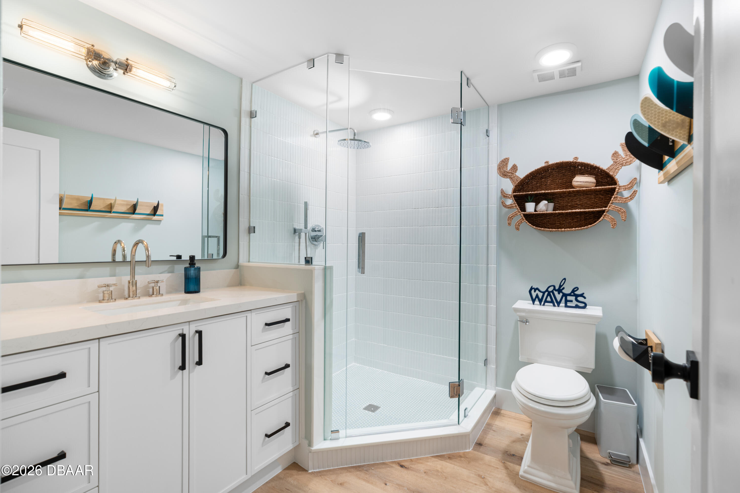 4565 South Atlantic Avenue, Unit 5410 Ponce Inlet, FL 32127 - Photo 48 of 67 a bathroom with a sink a toilet and shower