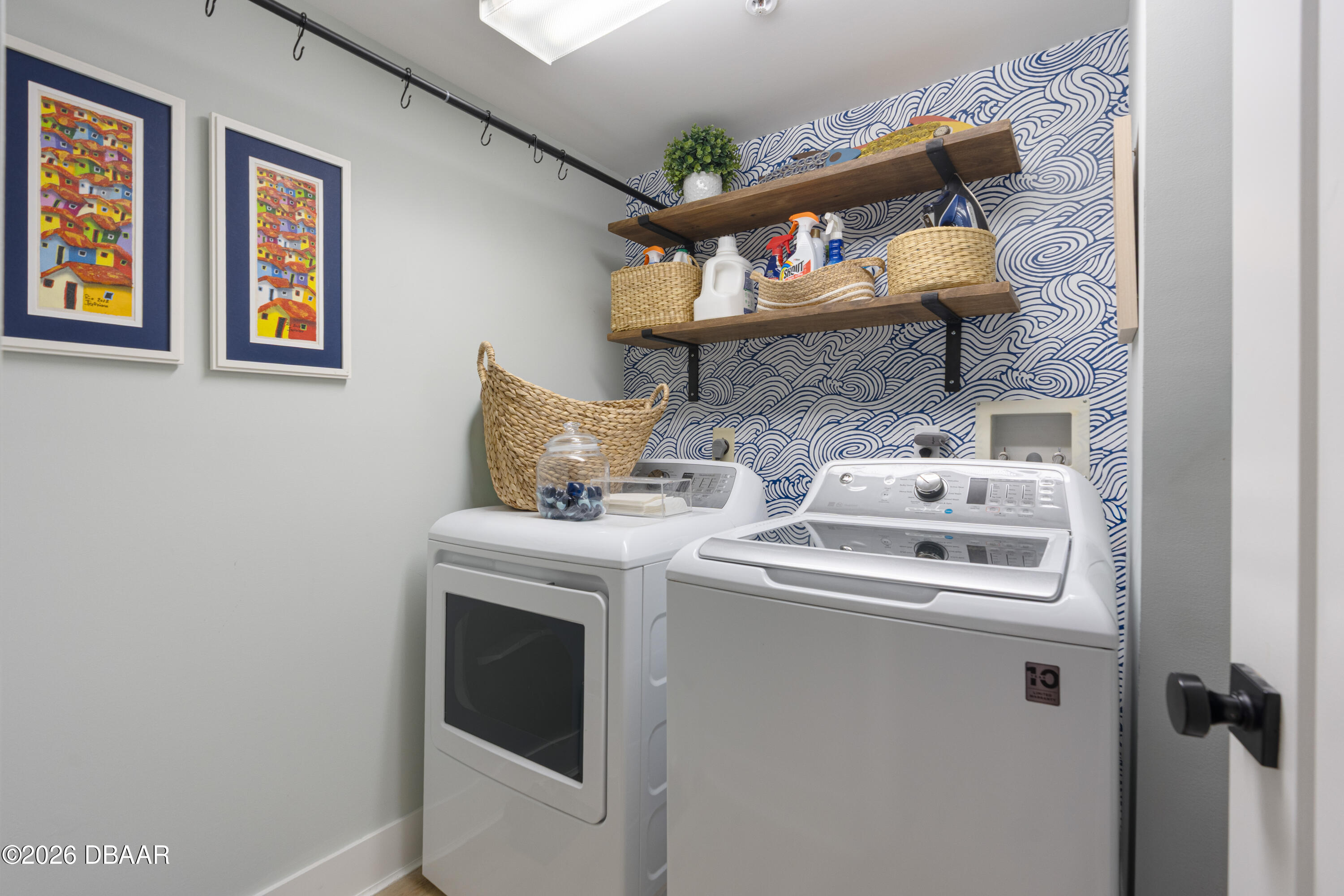 4565 South Atlantic Avenue, Unit 5410 Ponce Inlet, FL 32127 - Photo 49 of 67 a utility room with dryer and washer