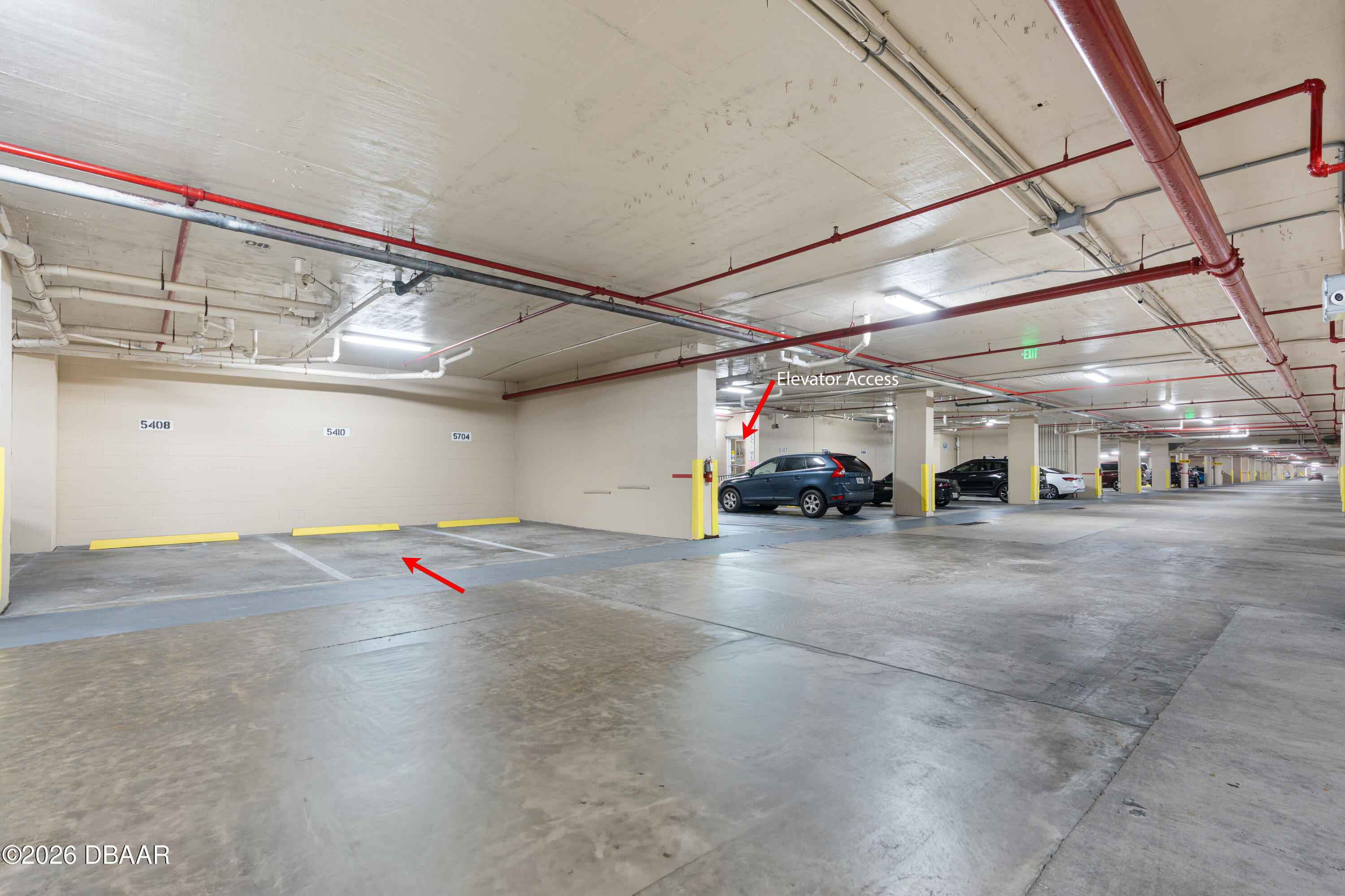 4565 South Atlantic Avenue, Unit 5410 Ponce Inlet, FL 32127 - Photo 50 of 67 a view of parking garage with cars