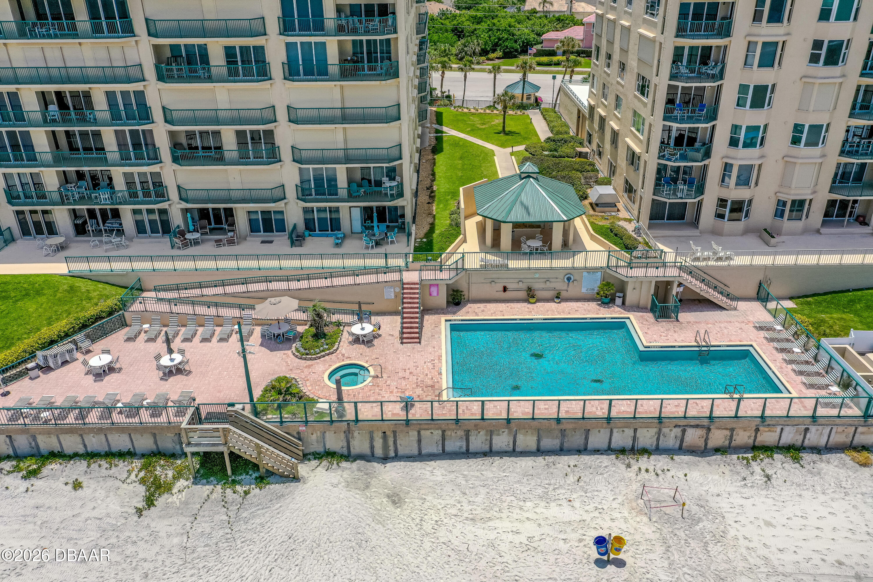 4565 South Atlantic Avenue, Unit 5410 Ponce Inlet, FL 32127 - Photo 54 of 67 an aerial view of a house with a garden and outdoor seating