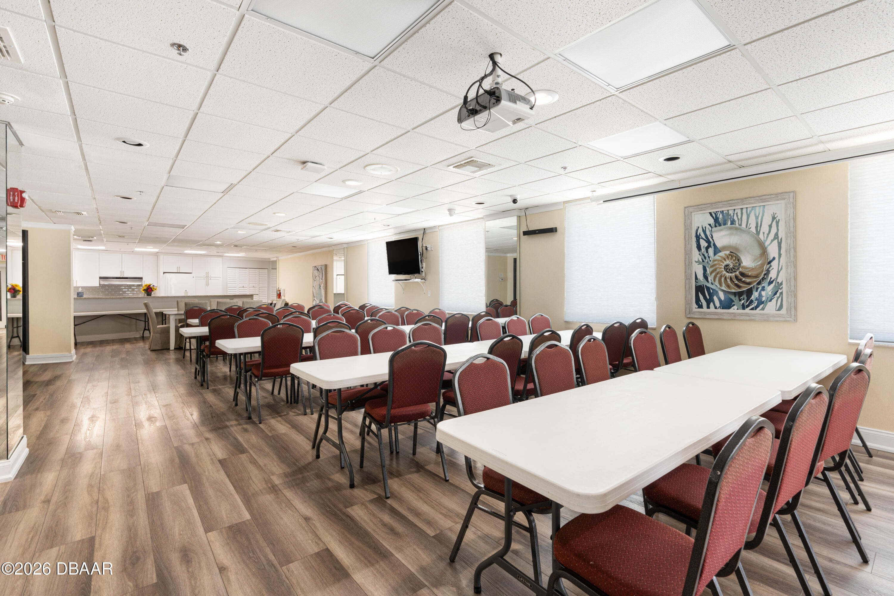 4565 South Atlantic Avenue, Unit 5410 Ponce Inlet, FL 32127 - Photo 58 of 67 a view of a dining room with furniture wooden floor and chandelier