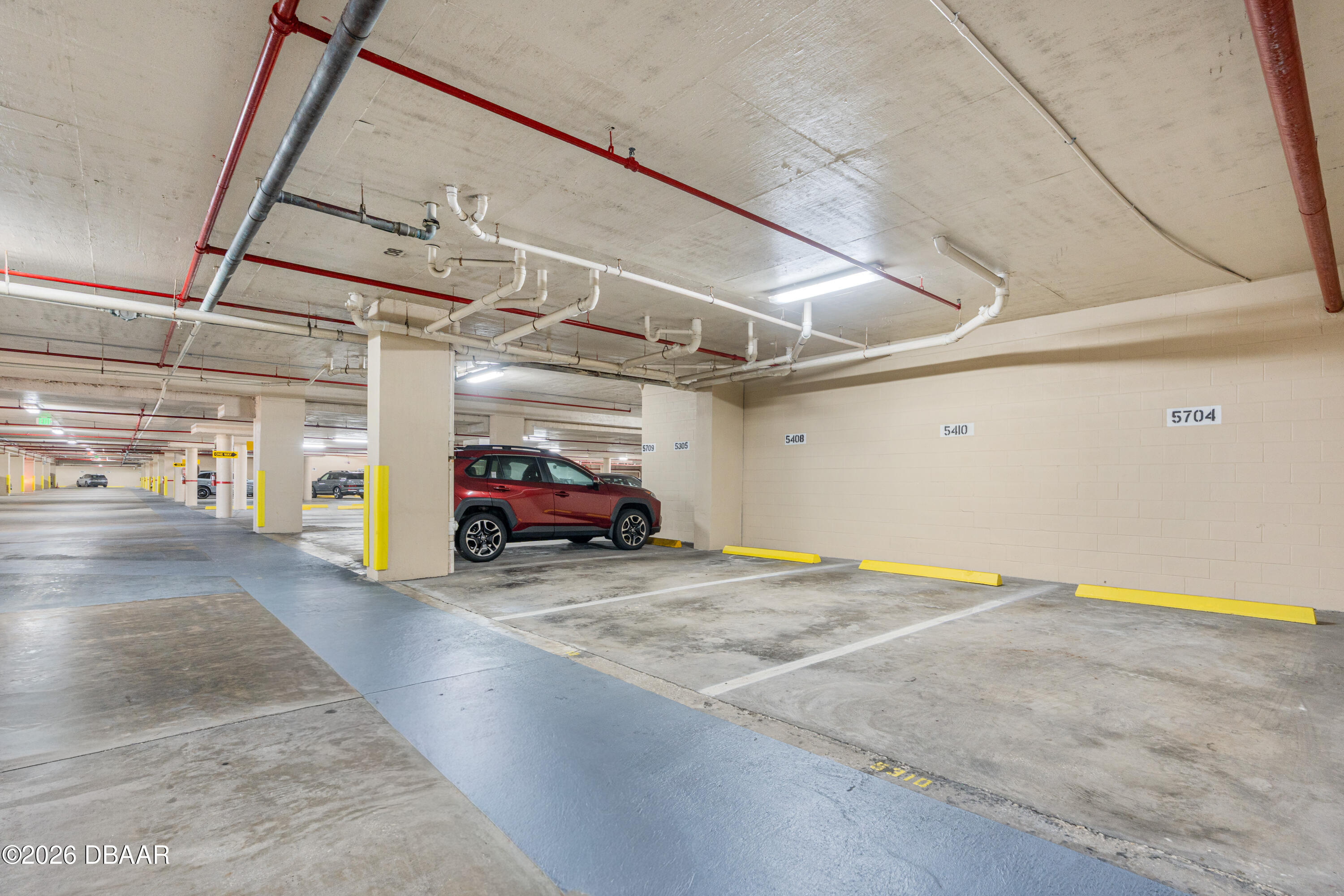 4565 South Atlantic Avenue, Unit 5410 Ponce Inlet, FL 32127 - Photo 64 of 67 a view of parking garage with cars
