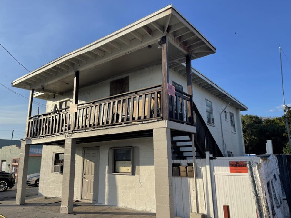1706 Ave D Fort Pierce, FL 34950 - Photo 2 of 4 a view of a house with entryway and stairs