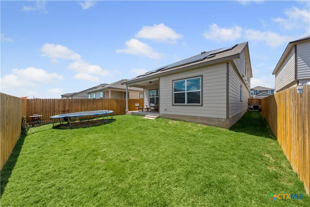 a house view with a garden space