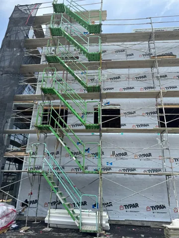 a kitchen with a table and chairs in it