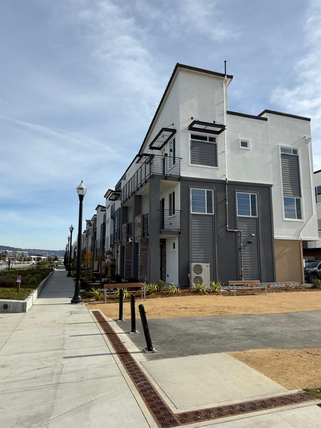 405 Sentinel Drive Alameda, CA 94501 - Photo 24 of 29 a view of a building with many windows