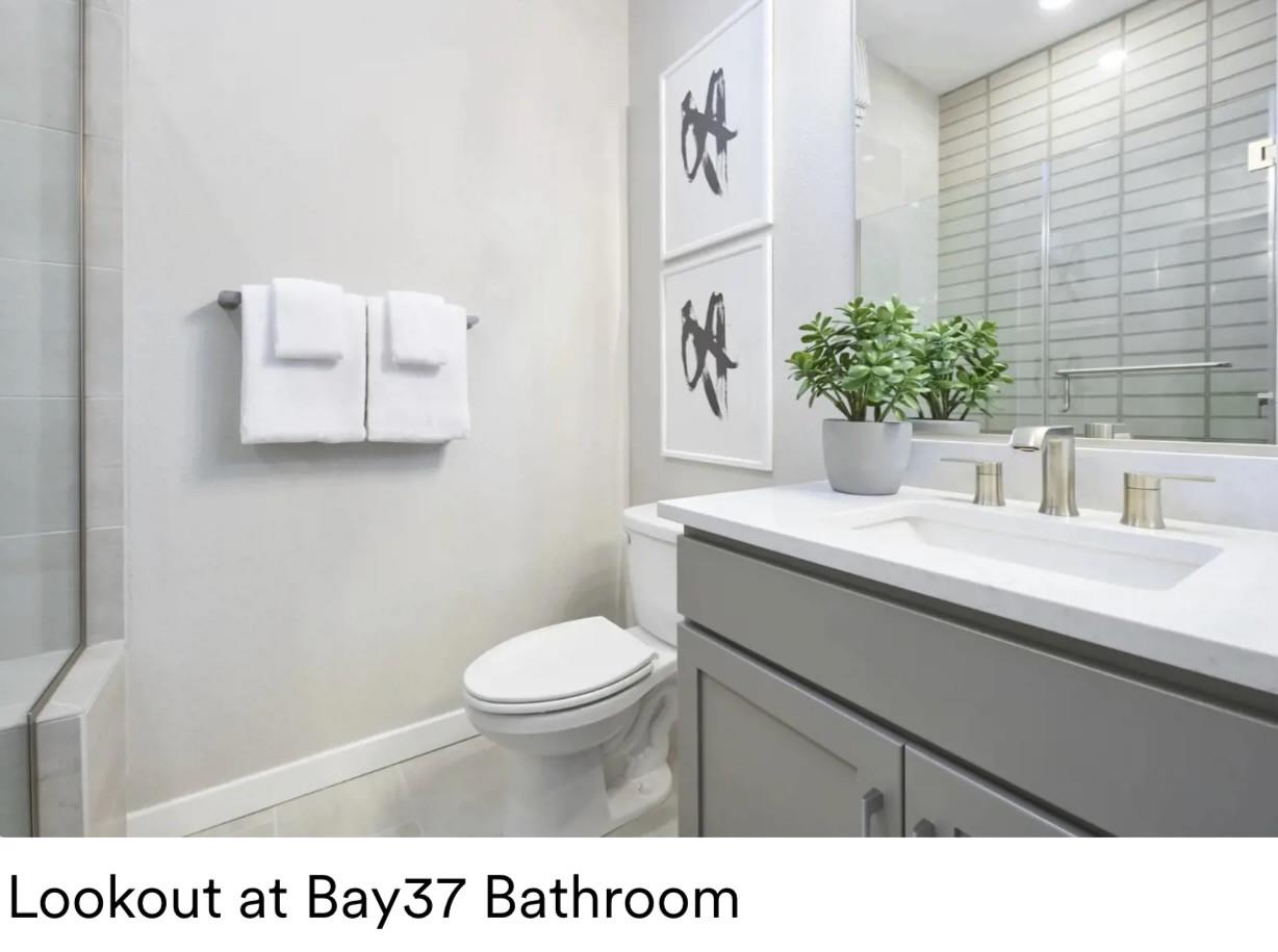 405 Sentinel Drive Alameda, CA 94501 - Photo 25 of 29 a bathroom with a sink and a mirror