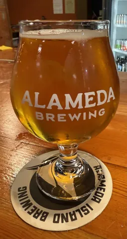 a view of a door with a bench and table and chair