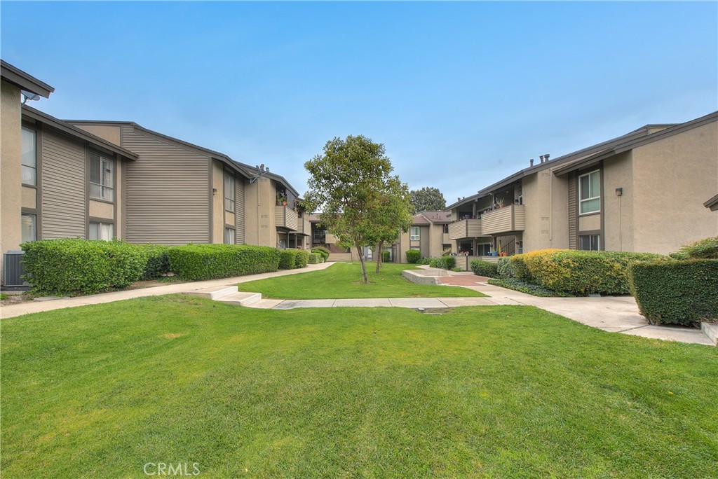 6351 Riverside Drive, Unit 69 Chino, CA 91710 - Photo 19 of 21 a view of a house with a big yard