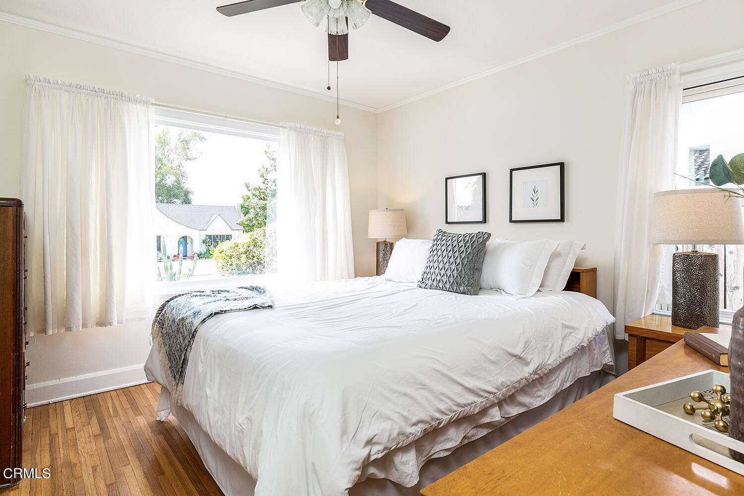 2023 Queensberry Road Pasadena, CA 91104 - Photo 16 of 26 a bedroom with a bed and wooden floor