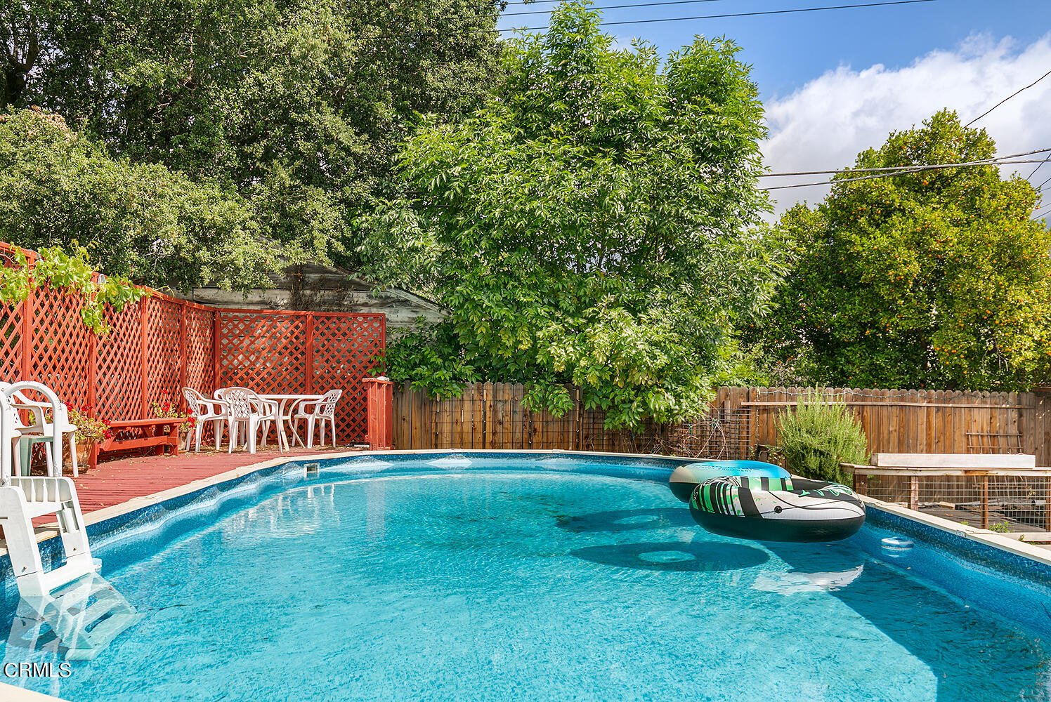 2023 Queensberry Road Pasadena, CA 91104 - Photo 26 of 26 a backyard of a house with table and chairs
