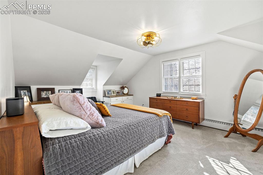 2 Cresta Road Colorado Springs, CO 80906 - Photo 16 of 33 a bed room with a bed and a window