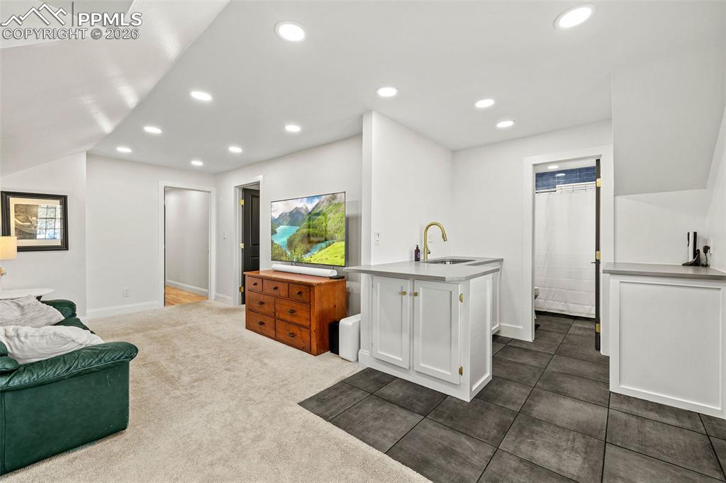 2 Cresta Road Colorado Springs, CO 80906 - Photo 26 of 33 a view of kitchen with stainless steel appliances granite countertop lots of white cabinets
