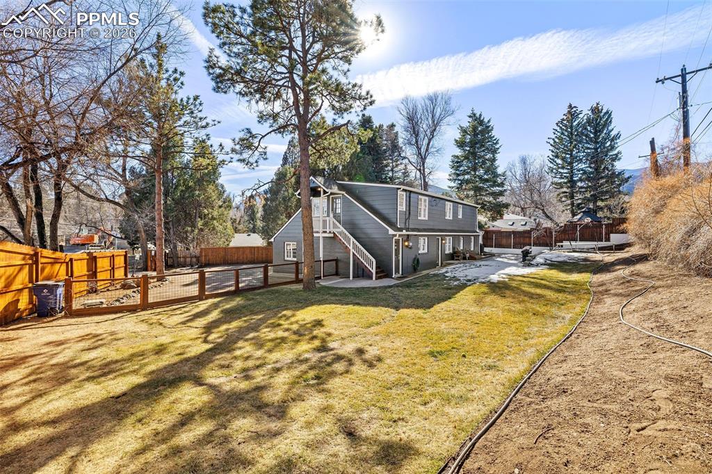 2 Cresta Road Colorado Springs, CO 80906 - Photo 3 of 33 a view of a house with snow in the backyard