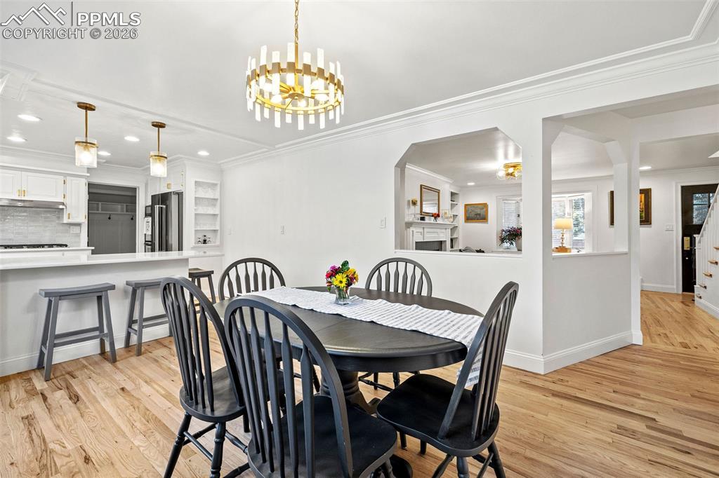 2 Cresta Road Colorado Springs, CO 80906 - Photo 8 of 33 a view of a dining room with furniture