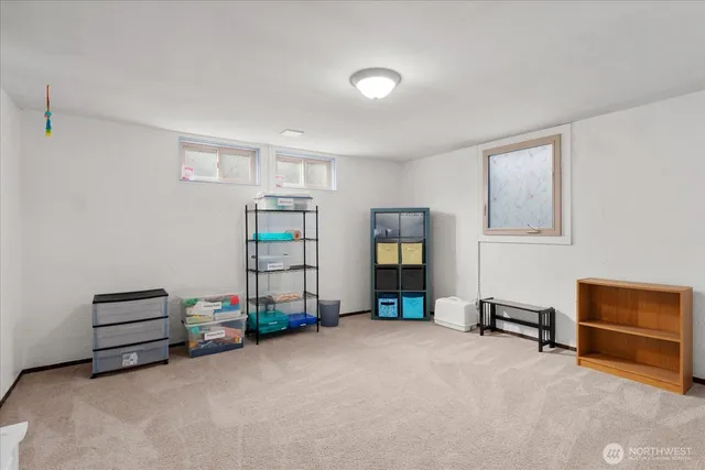 a view of livingroom with furniture and window
