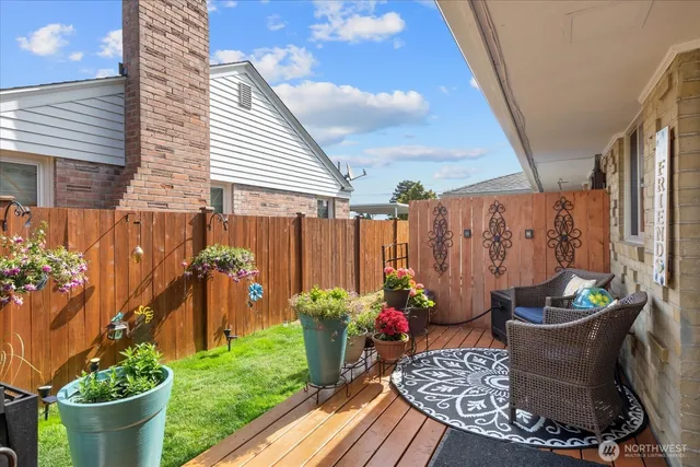 a view of a porch filled with furniture