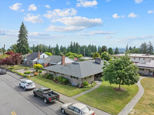 a view of a patio with table and chairs and potted plants