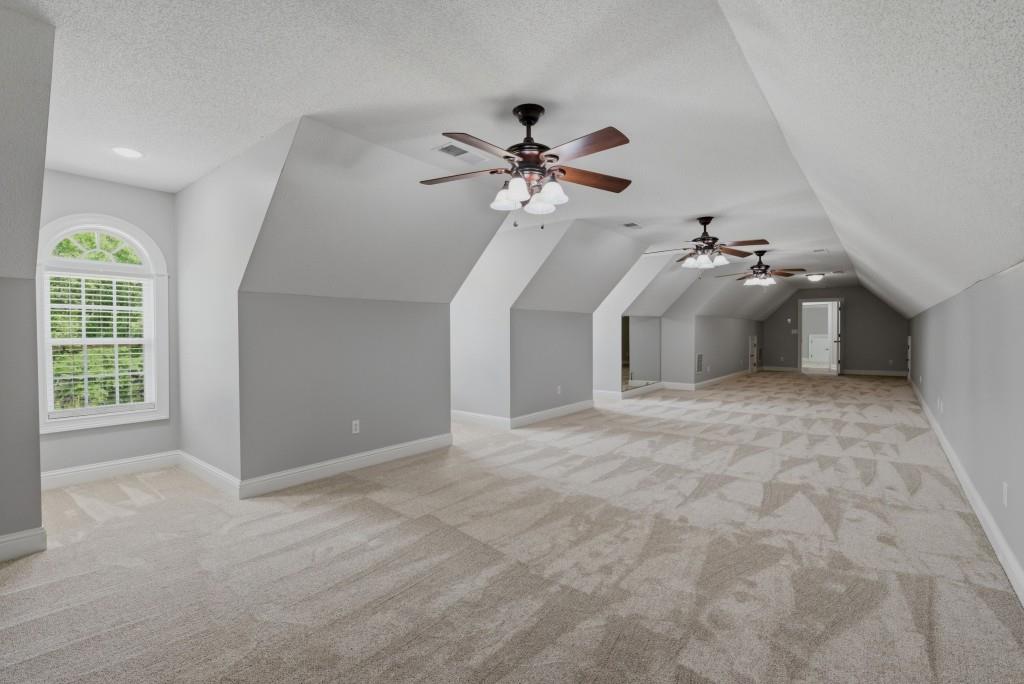582 Knox Chapel Road Social Circle, GA 30025 - Photo 28 of 49 a view of a livingroom with a ceiling fan and window