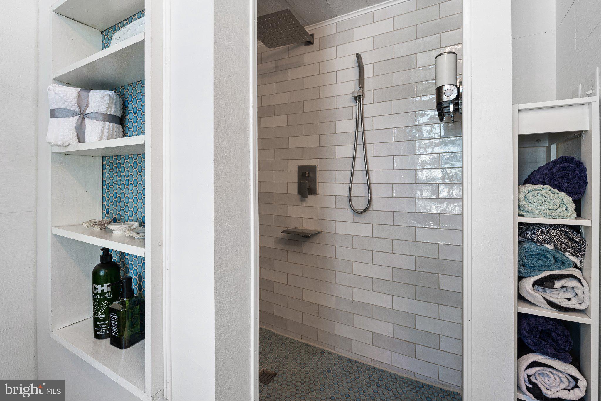 9 South New Road Middletown, DE 19709 - Photo 21 of 41 a bathroom with a shower and a sink