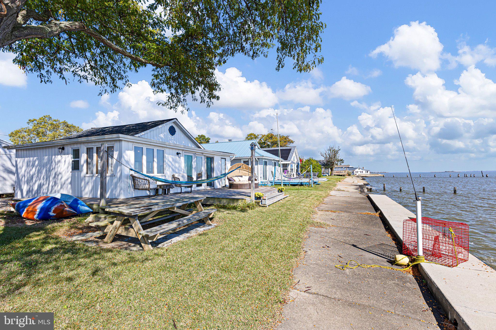 9 South New Road Middletown, DE 19709 - Photo 4 of 41 a view of a house with swimming pool and sitting area