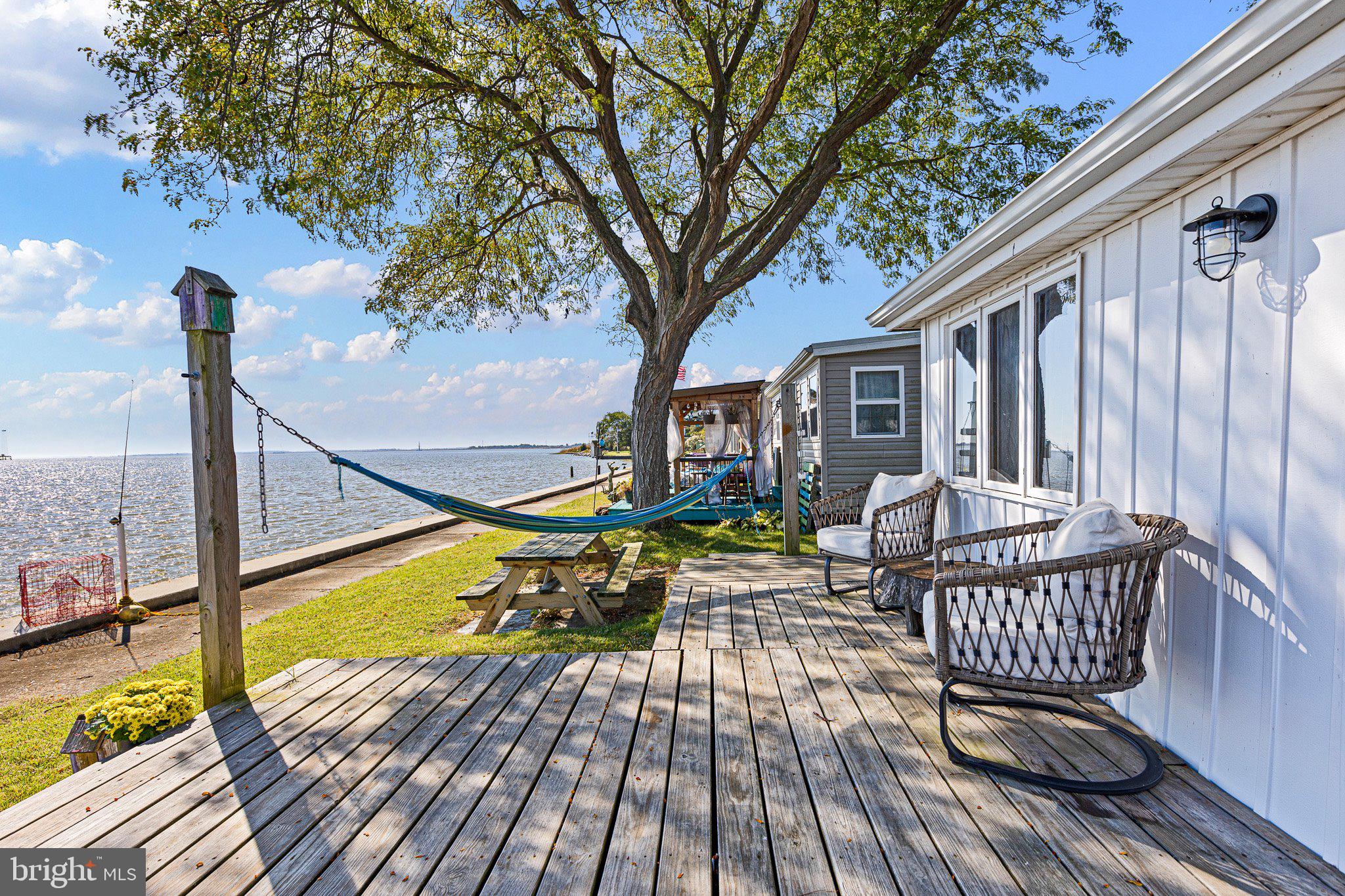 9 South New Road Middletown, DE 19709 - Photo 6 of 41 a view of a chairs on the deck