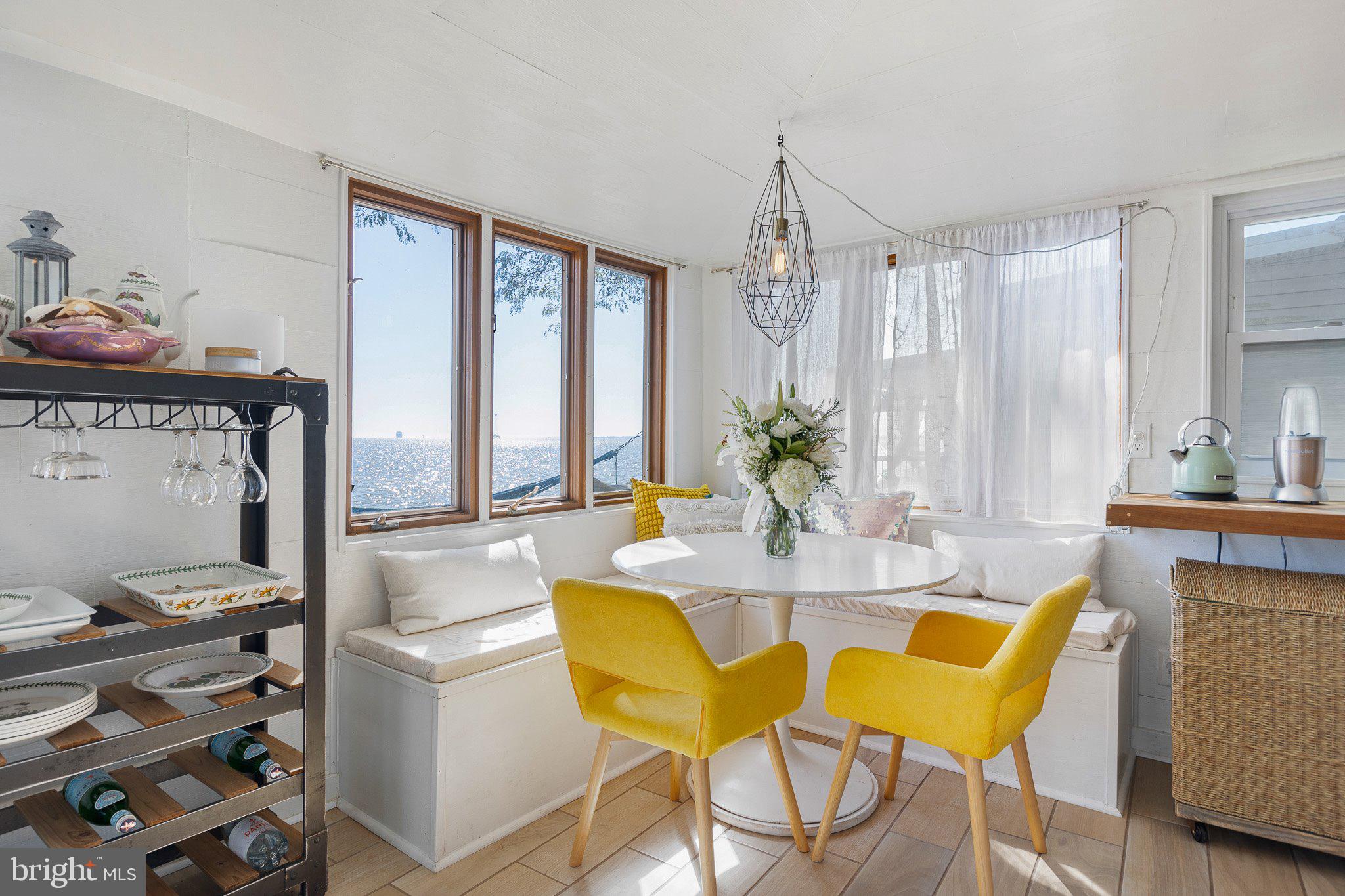 9 South New Road Middletown, DE 19709 - Photo 8 of 41 a view of a dining room with furniture window and outside view