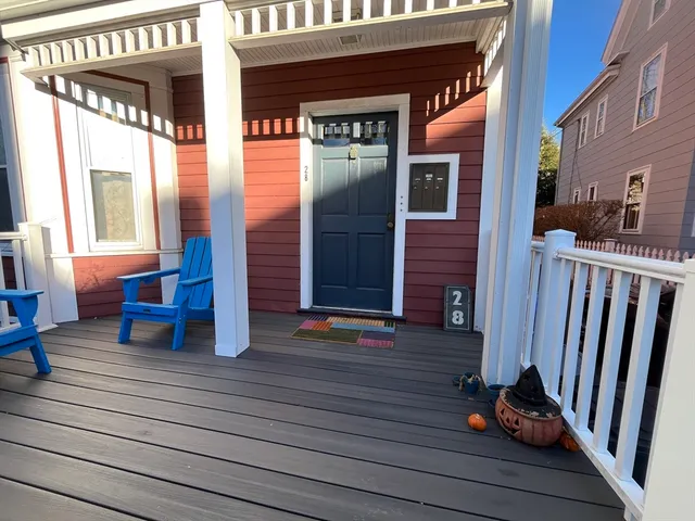 a view of a building with wooden floor and windows