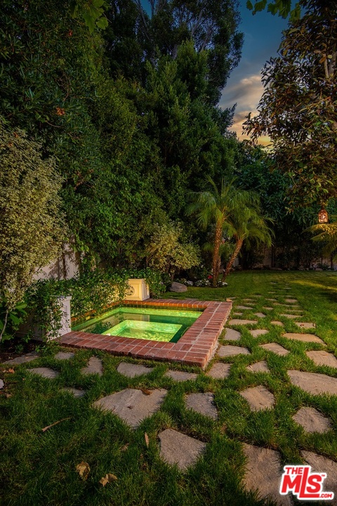 120 Homewood Road Los Angeles, CA 90049 - Photo 18 of 47 a view of a golf course with a park