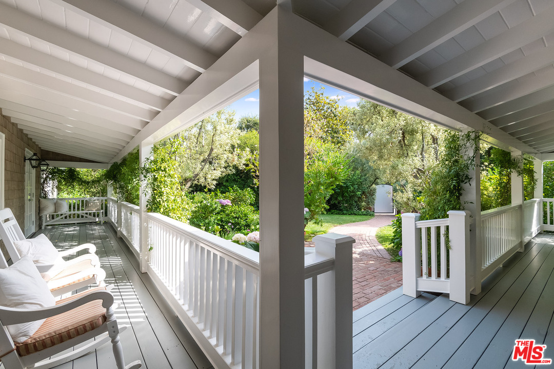 120 Homewood Road Los Angeles, CA 90049 - Photo 22 of 47 a view of a two chairs in balcony