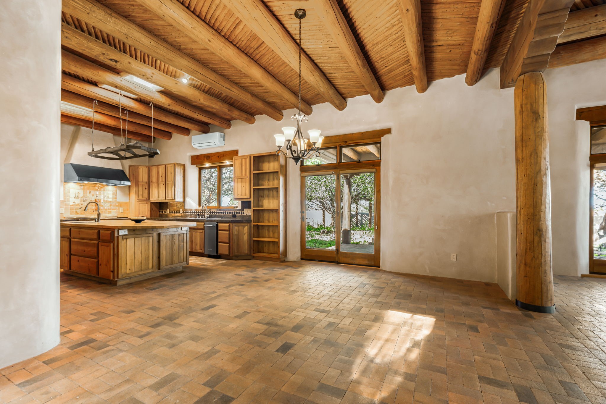 10 Antigua Road Santa Fe, NM 87508 - Photo 16 of 57 Dining room - doors to rear portal