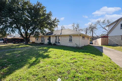 a bathroom with a sink toilet and vanity