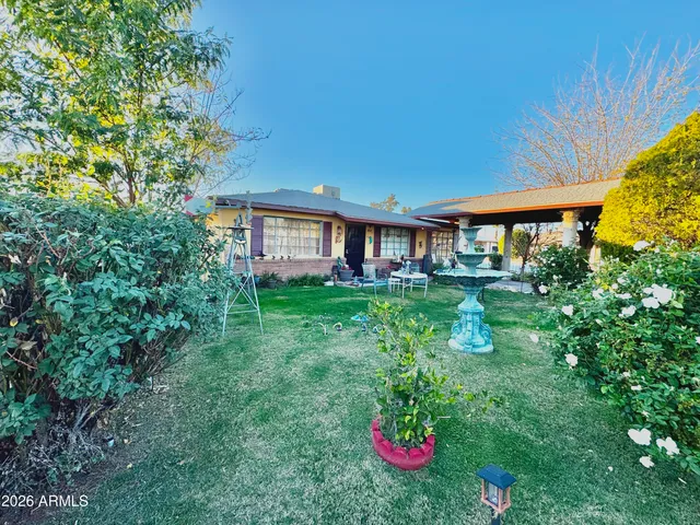 a view of a house with a big yard