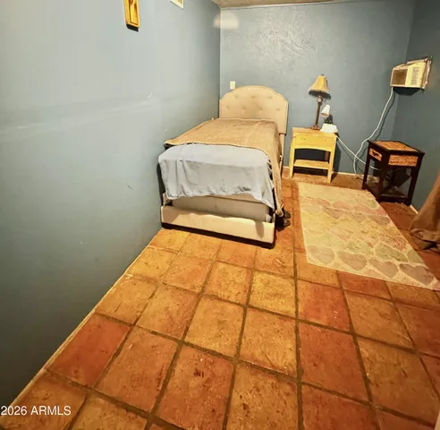 a backyard of a house with outdoor seating