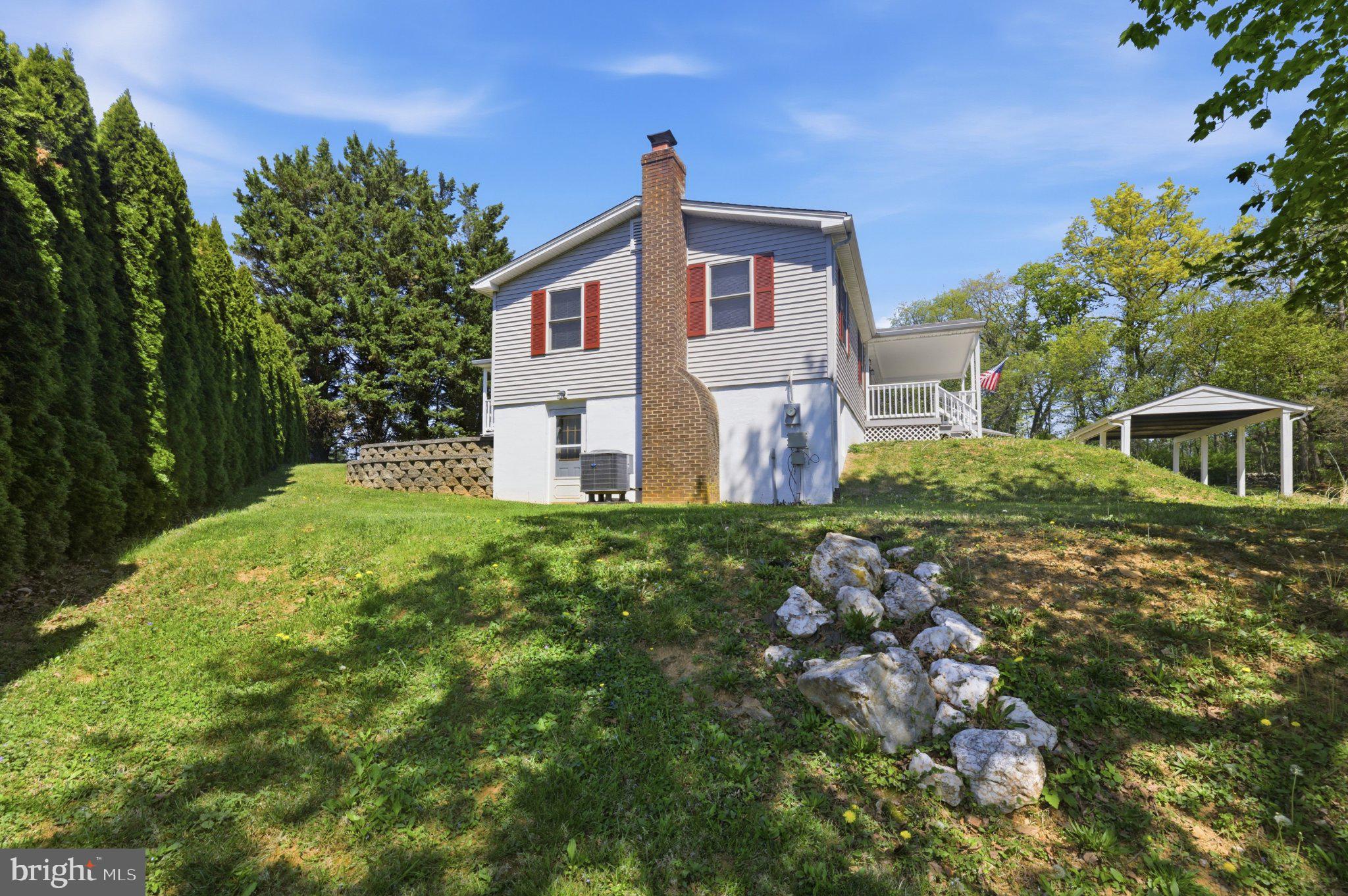 3624 Kemptown Church Road Monrovia, MD 21770 - Photo 19 of 68 Charming hillside retreat with greenery.
