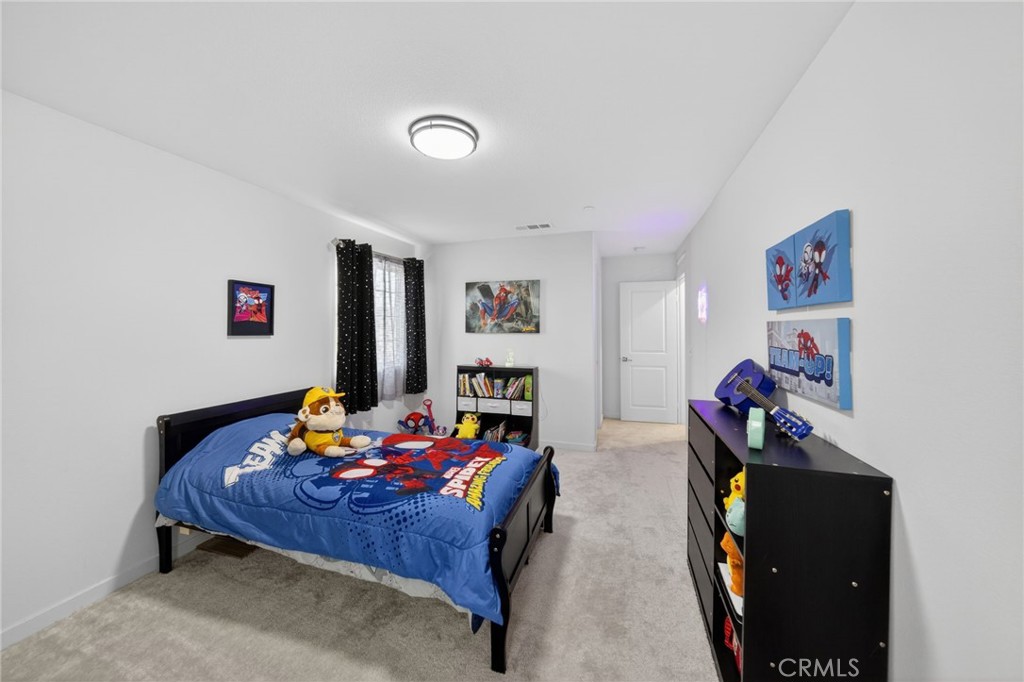 587 Holston Street Rialto, CA 92377 - Photo 23 of 44 Second Floor Bedroom with Walk-In Closet