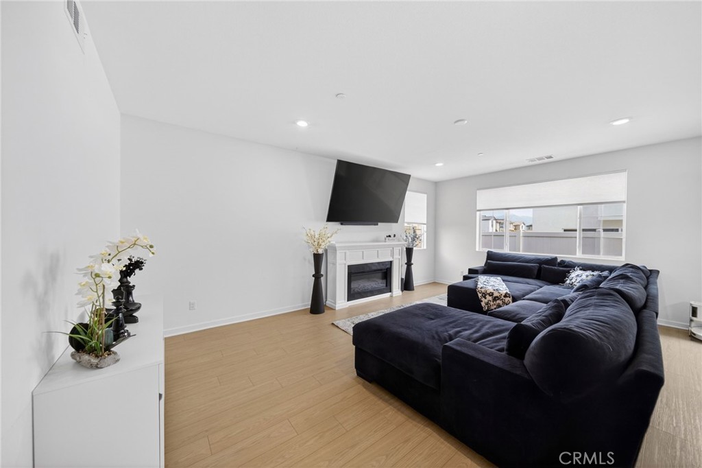 587 Holston Street Rialto, CA 92377 - Photo 9 of 44 Living Room - Virtually Enhanced