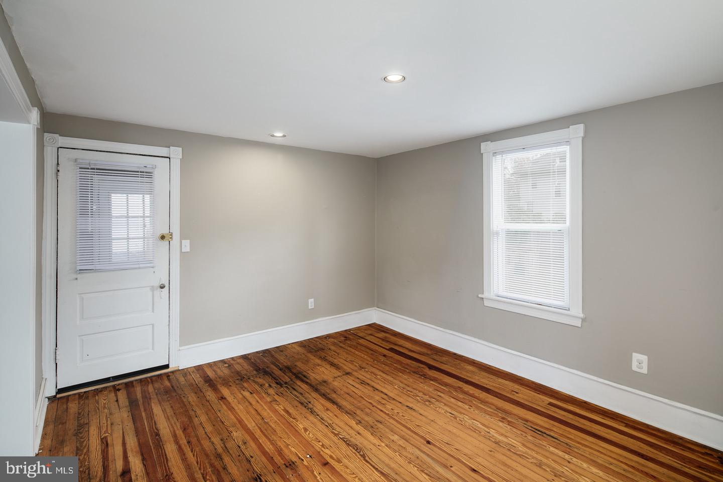 123 Potter Street Haddonfield, NJ 08033 - Photo 13 of 31 wooden floor in an empty room with a window