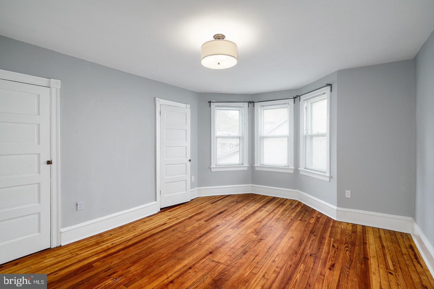 123 Potter Street Haddonfield, NJ 08033 - Photo 21 of 31 a view of empty room with wooden floor and fan
