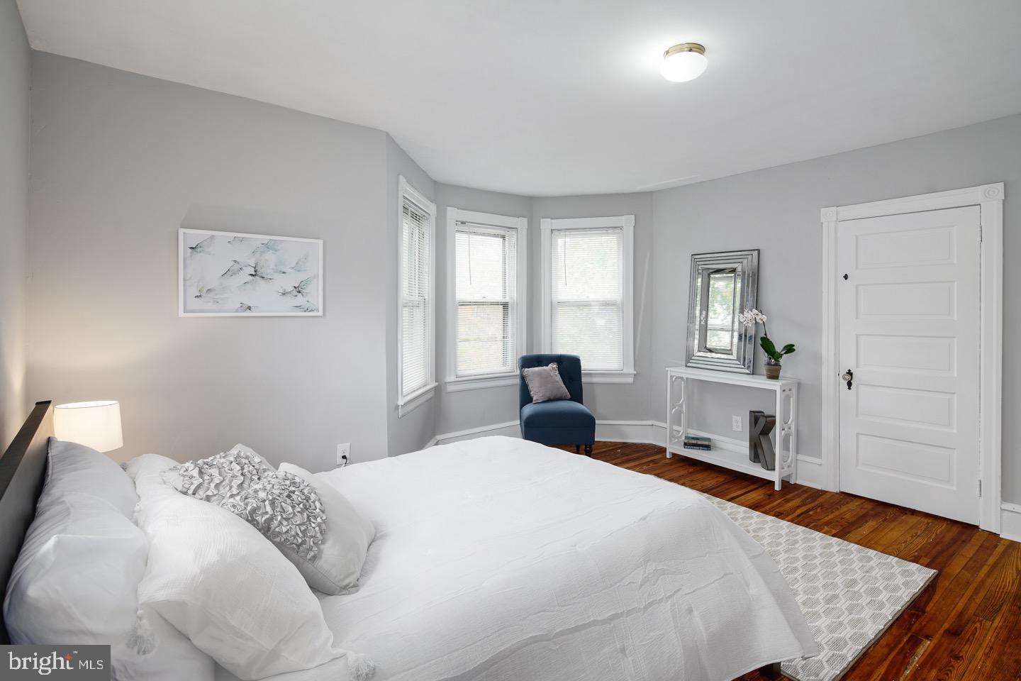 123 Potter Street Haddonfield, NJ 08033 - Photo 24 of 31 a bedroom with a large bed and a window