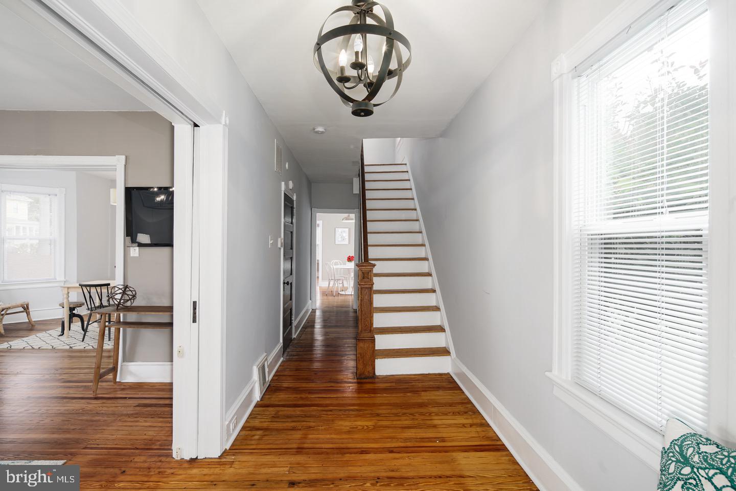 123 Potter Street Haddonfield, NJ 08033 - Photo 4 of 31 a view of a hallway with wooden floor and entryway
