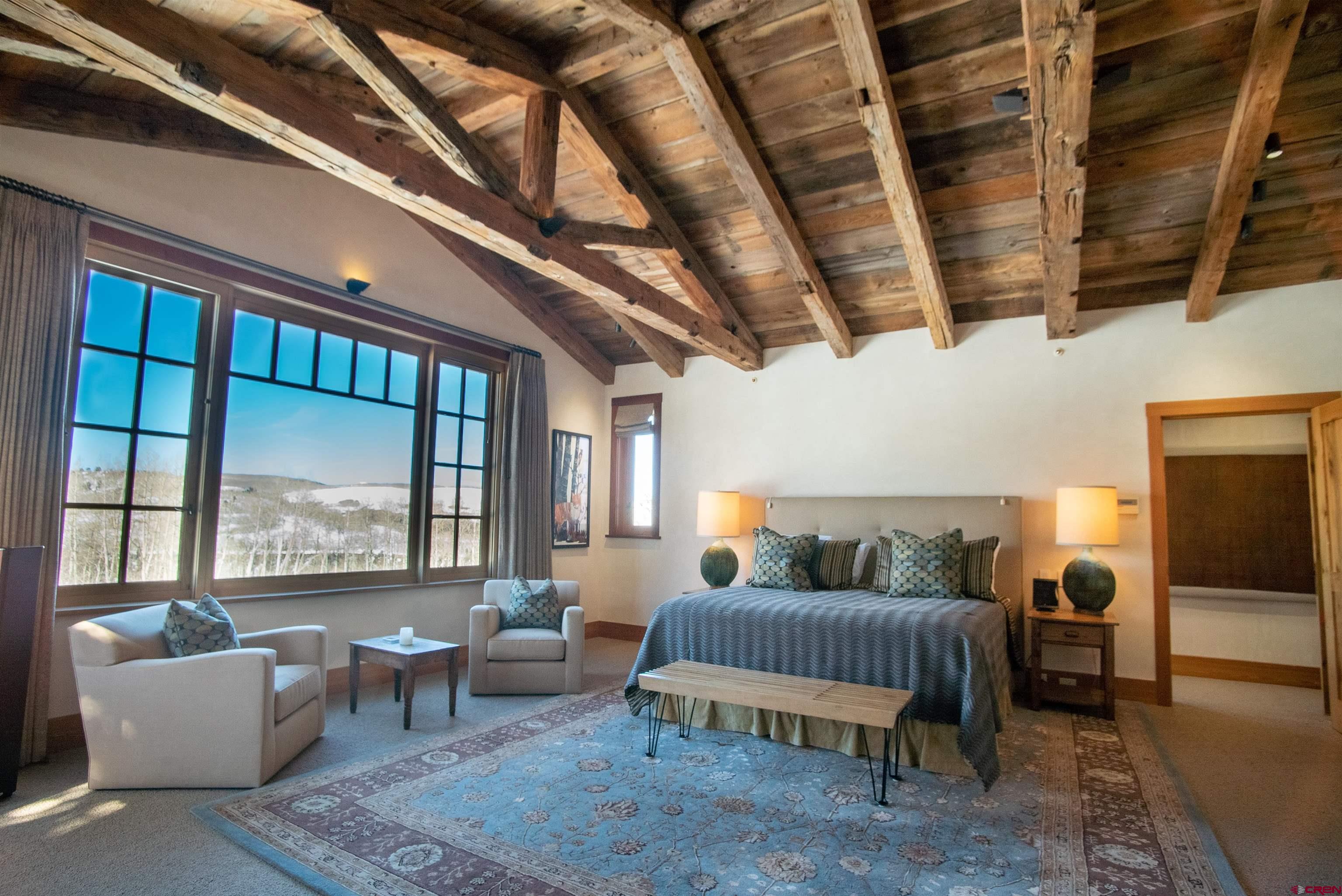 8121 Preserve Drive Telluride, CO 81435 - Photo 21 of 35 a living room with furniture and a large window