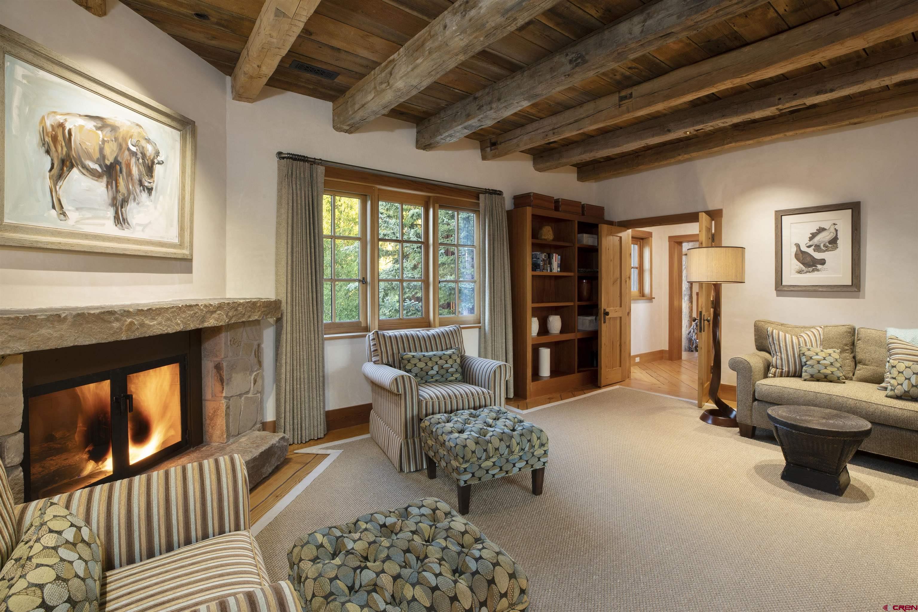 8121 Preserve Drive Telluride, CO 81435 - Photo 25 of 35 a living room with furniture and a fireplace