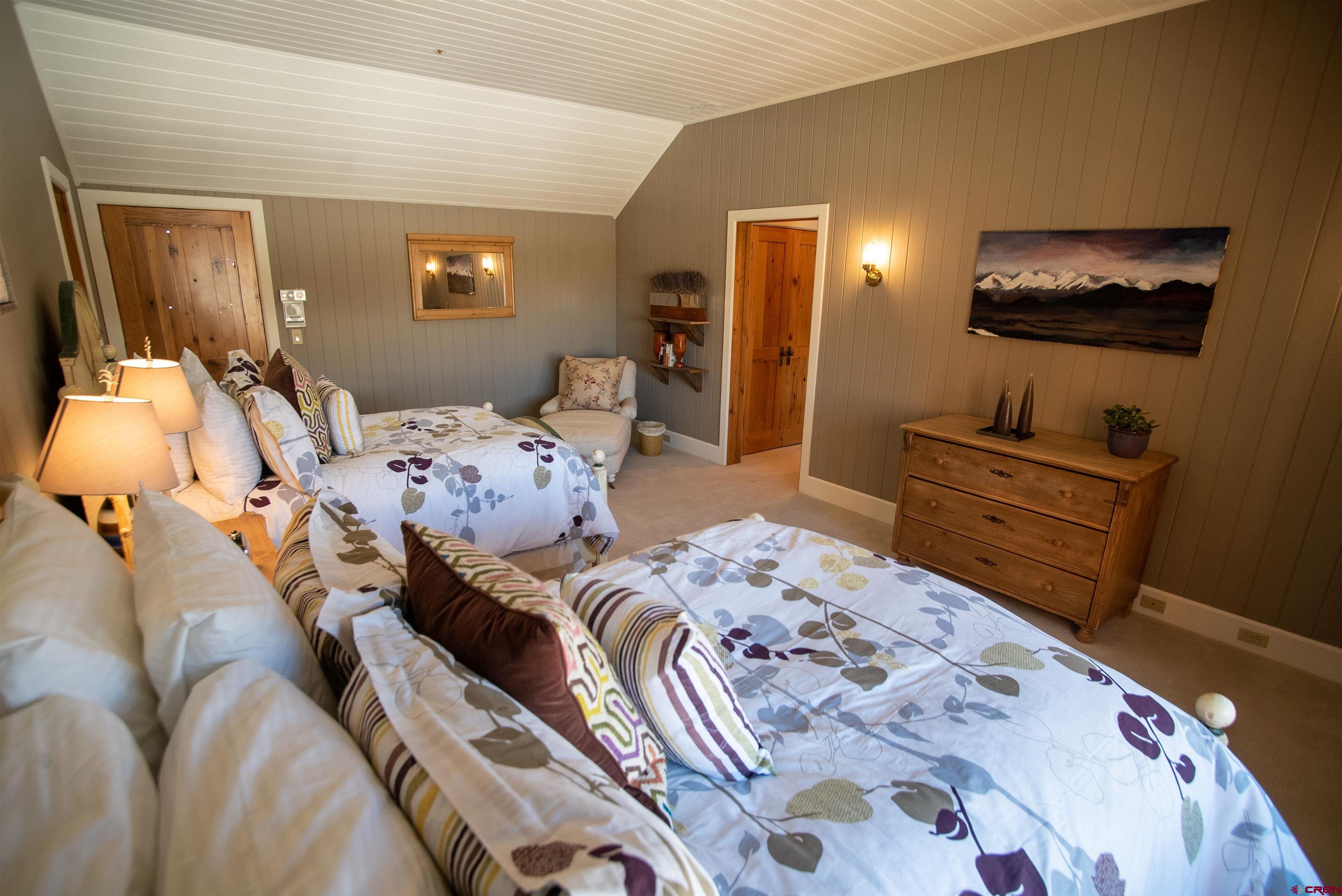 8121 Preserve Drive Telluride, CO 81435 - Photo 29 of 35 a bedroom with two beds and a dresser