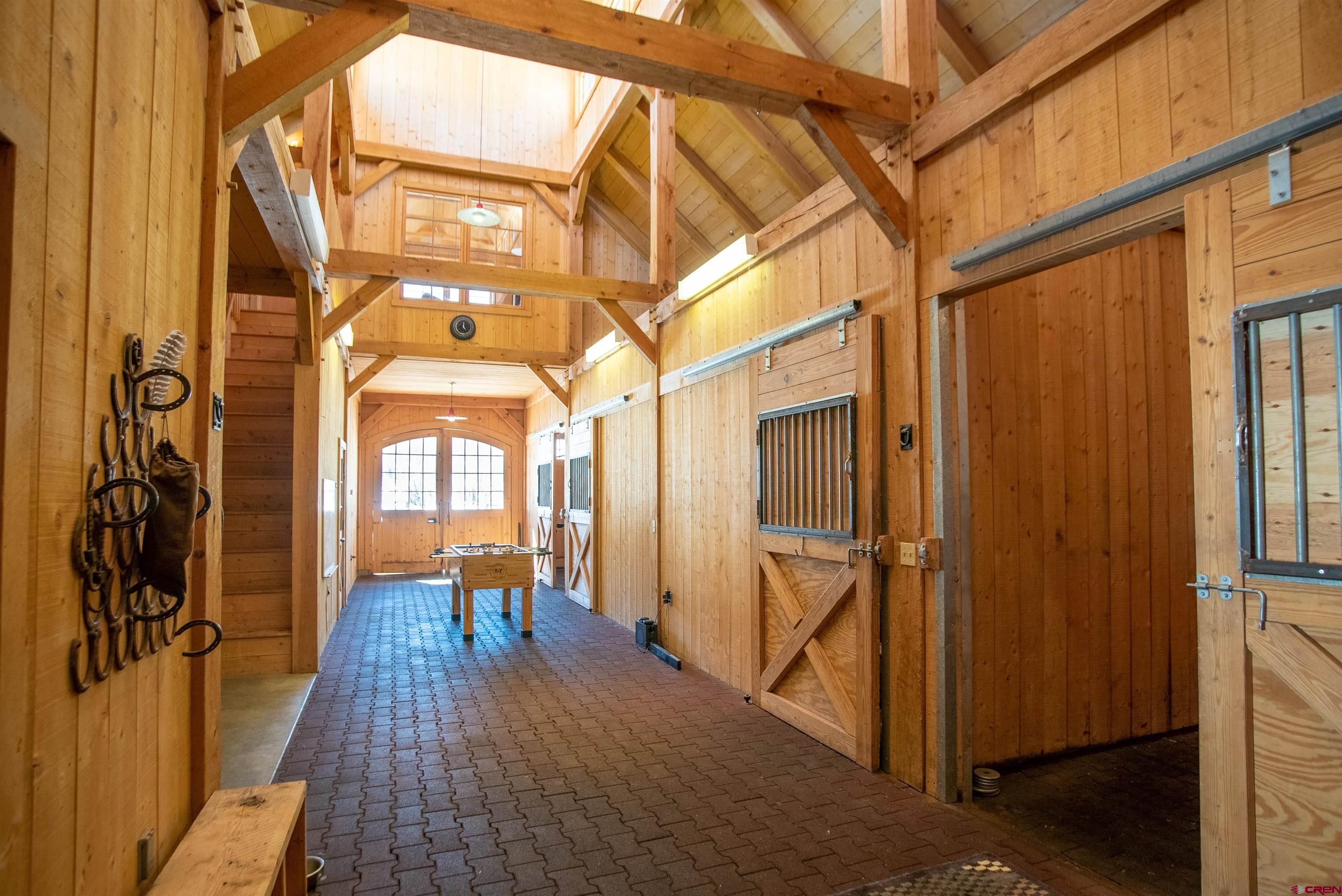 8121 Preserve Drive Telluride, CO 81435 - Photo 32 of 35 a view of a porch with wooden floor and furniture