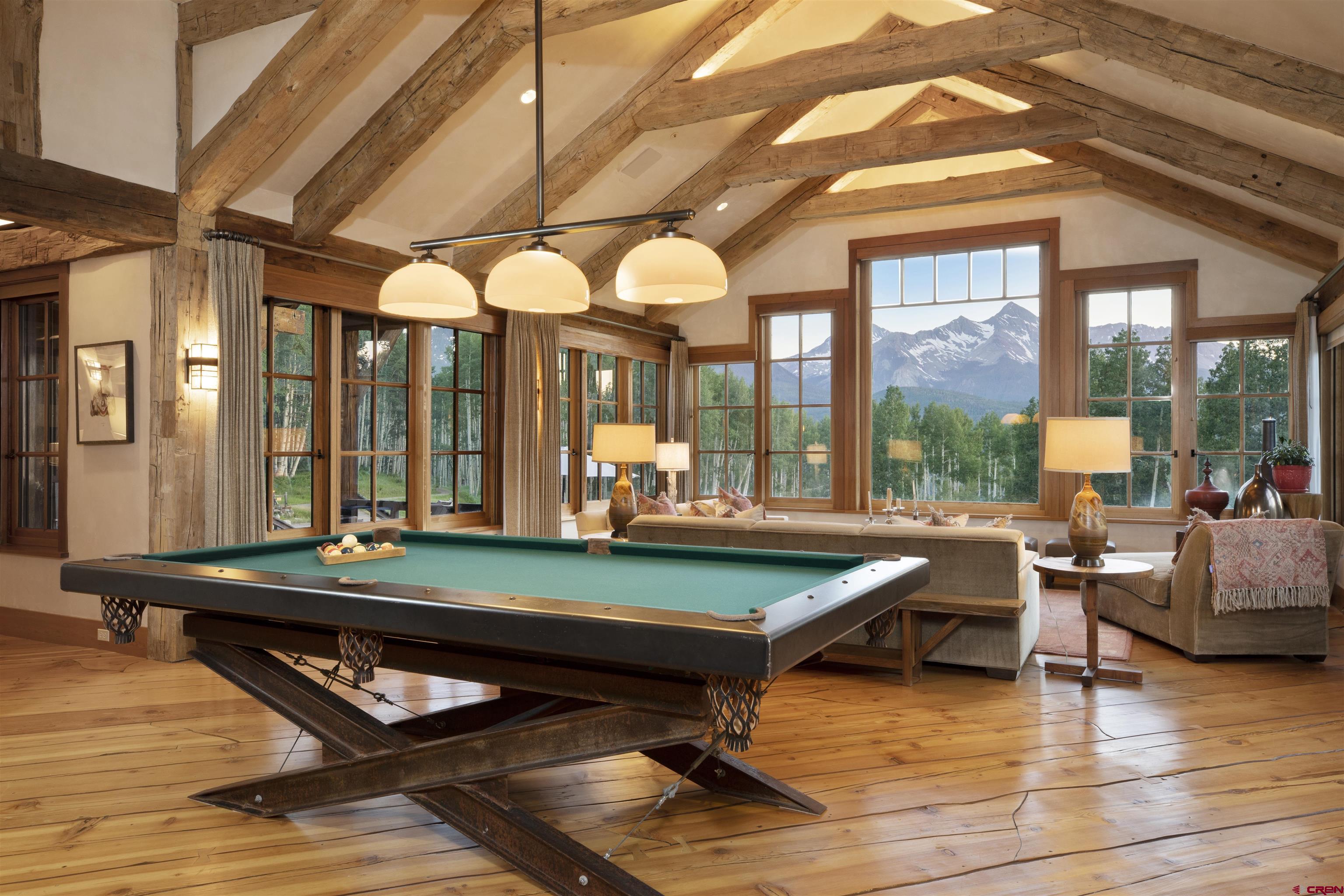 8121 Preserve Drive Telluride, CO 81435 - Photo 7 of 35 a room with furniture pool table and windows