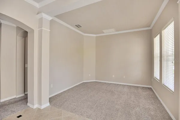 an empty room with windows