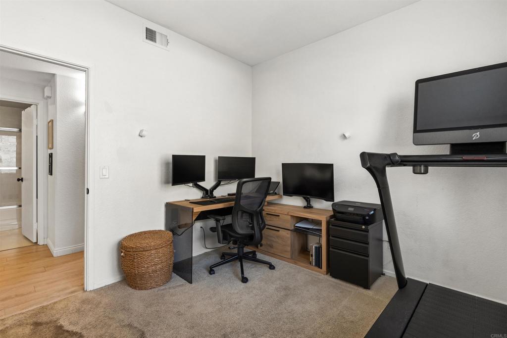 3183 Dehesa Road, Unit 19 El Cajon, CA 92019 - Photo 16 of 26 a view of a livingroom with workspace and a window