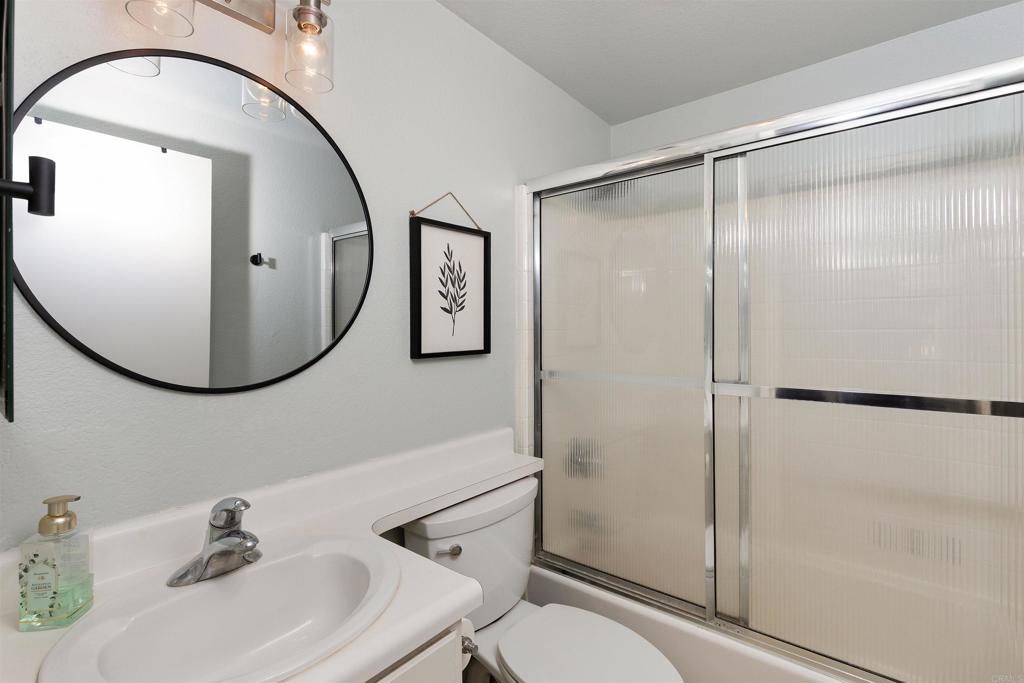 3183 Dehesa Road, Unit 19 El Cajon, CA 92019 - Photo 18 of 26 a bathroom with a sink toilet and shower